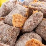 Delicious Butterfinger Puppy Chow made with chocolate and Butterfinger candy
