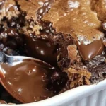 Decadent Chocolate Lava Cake with melting chocolate center, served on a plate