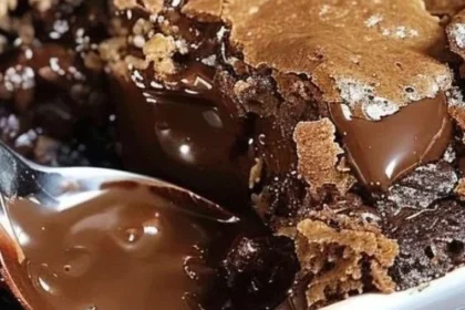 Decadent Chocolate Lava Cake with melting chocolate center, served on a plate