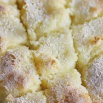 A slice of French butter cake with a golden crust and fluffy texture.