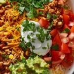 Healthy turkey taco bowl with fresh ingredients and vibrant toppings