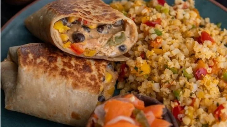 High protein burritos filled with beans, chicken, and fresh vegetables