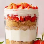 Delicious high protein cheesecake jars ready to enjoy as a healthy dessert.