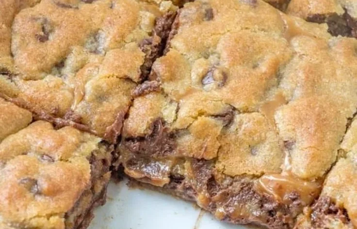 Delicious homemade Knock You Naked Bars on a wooden table