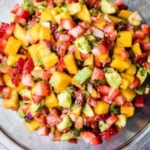 Fresh Avocado Strawberry Mango Salsa with vibrant fruits in a bowl