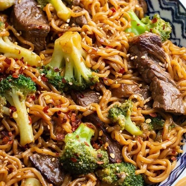 Beef and Broccoli Ramen Stir Fry dish garnished with green onions