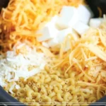 Delicious bowl of the best Mac and Cheese topped with breadcrumbs and herbs