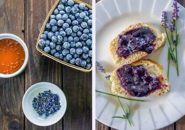 Jar of homemade blueberry lavender jam with fresh blueberries and lavender sprigs