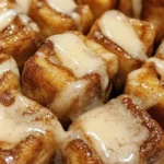 Cinnamon Roll French Toast Bites recipe with syrup and toppings