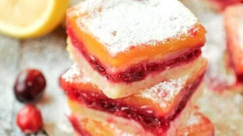 Delicious cranberry lemon bars with a zesty lemon filling and cranberry topping.