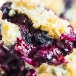 Delicious easy 3 ingredient blueberry dump cake fresh out of the oven.