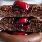 Easy chocolate cherry thumbprint cookies with a cherry filling.