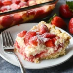 Delicious Easy Strawberry Cheesecake Dump Cake made with fresh strawberries.
