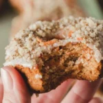 Gluten-free and dairy-free baked carrot cake donuts with icing