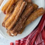 Delicious gluten free churros served with chocolate sauce