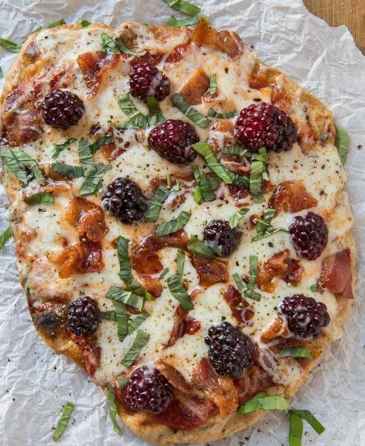 Delicious homemade pizza topped with fresh ingredients and melted cheese.