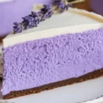 No-bake Lavender Honey Cheesecake topped with fresh lavender flowers.