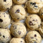 Plate of freshly baked lemon blueberry cookies with a citrusy glaze