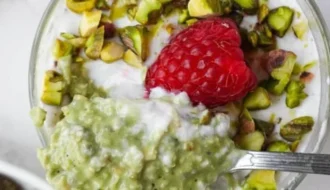 Delicious Pistachio Overnight Oats served in a bowl with nuts and fruits