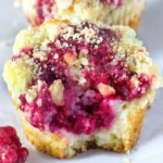 Delicious raspberry streusel muffins with a crumbly topping and fresh raspberries