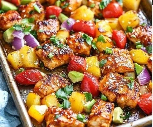 Delicious Sheet Pan Hawaiian Chicken with vibrant vegetables and tropical flavor.