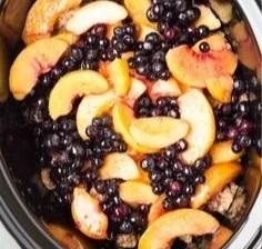 Delicious slow cooker blueberry peach cobbler served in a dish