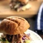 A delicious slow cooker dinner set on a dining table ready to serve.