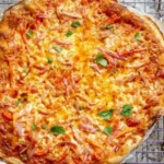 Delicious Thai Curry Pizza topped with fresh ingredients and vibrant flavors.