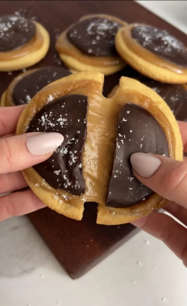 Paleo-friendly Twix Cookies topped with caramel and chocolate.