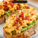 Avocado toast topped with a perfectly cooked egg, ideal for breakfast