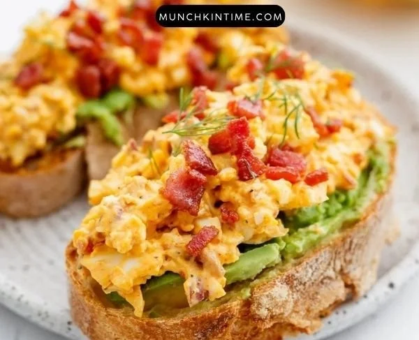 Avocado toast topped with a perfectly cooked egg, ideal for breakfast