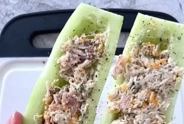 Bacon Ranch Chicken Salad served in cucumber boats for a healthy snack