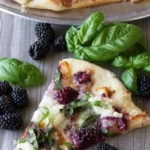 Delicious blackberry basil ricotta pizza topped with fresh ingredients
