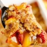 Delicious strawberry peach crisp dessert in a baking dish