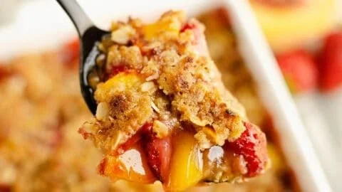 Delicious strawberry peach crisp dessert in a baking dish