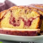 Delicious blackberry pound cake with fresh blackberries on a plate