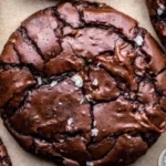 Delicious brownie cookies stacked on a plate, showcasing rich chocolate flavor.