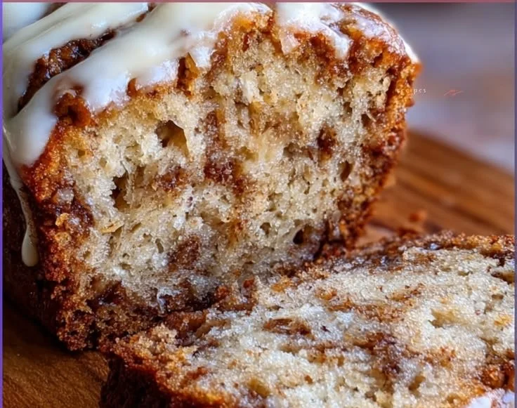 Delicious cinnamon roll banana bread ready to be served on a plate.