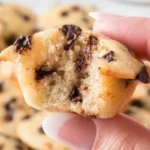 Mini chocolate chip muffins fresh out of the oven, ready to be enjoyed.