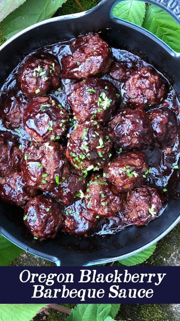 Delicious homemade blackberry barbecue sauce in a jar with fresh blackberries.