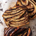 Delicious gluten-free chocolate babka loaf showcasing rich chocolate swirls
