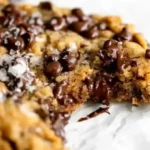 Gluten free peanut butter chocolate chip cookies on a baking tray