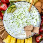 Easy Key Lime Pie fruit dip recipe served in a bowl with lime garnishes.