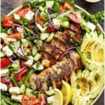 A variety of healthy dinner options including salads, grilled chicken, and vegetables.