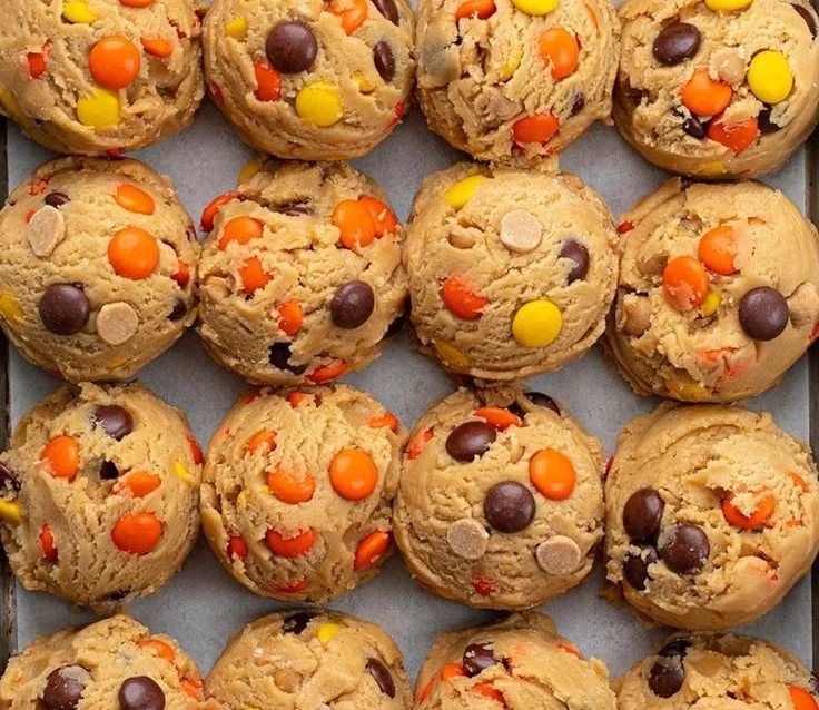 Delicious Reese's Pieces Peanut Butter Cookies on a cooling rack