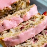Delicious homemade Strawberry Banana Bread sliced and ready to serve.