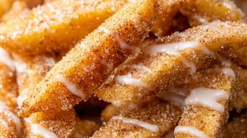 Air fryer apple fries served in a bowl, crispy and delicious snack.
