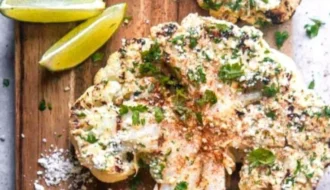 Cauliflower Elote dish topped with cheese and spices