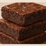 Delicious homemade chewy chocolate brownies on a plate