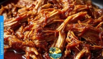 Delicious Crock Pot BBQ pulled pork served with coleslaw on a sandwich